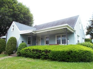 small blue hosue with porch in leesport pa sold july 2021 with Wagner Auction Service